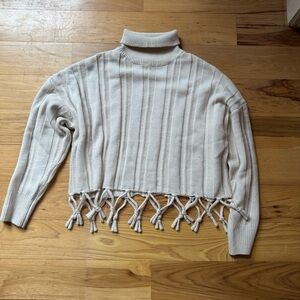Cream Turtleneck Sweater with Fringe